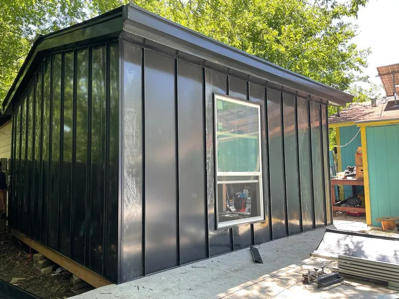 Black standing seam metal wall panels for Roof Inspection in Marshalltown